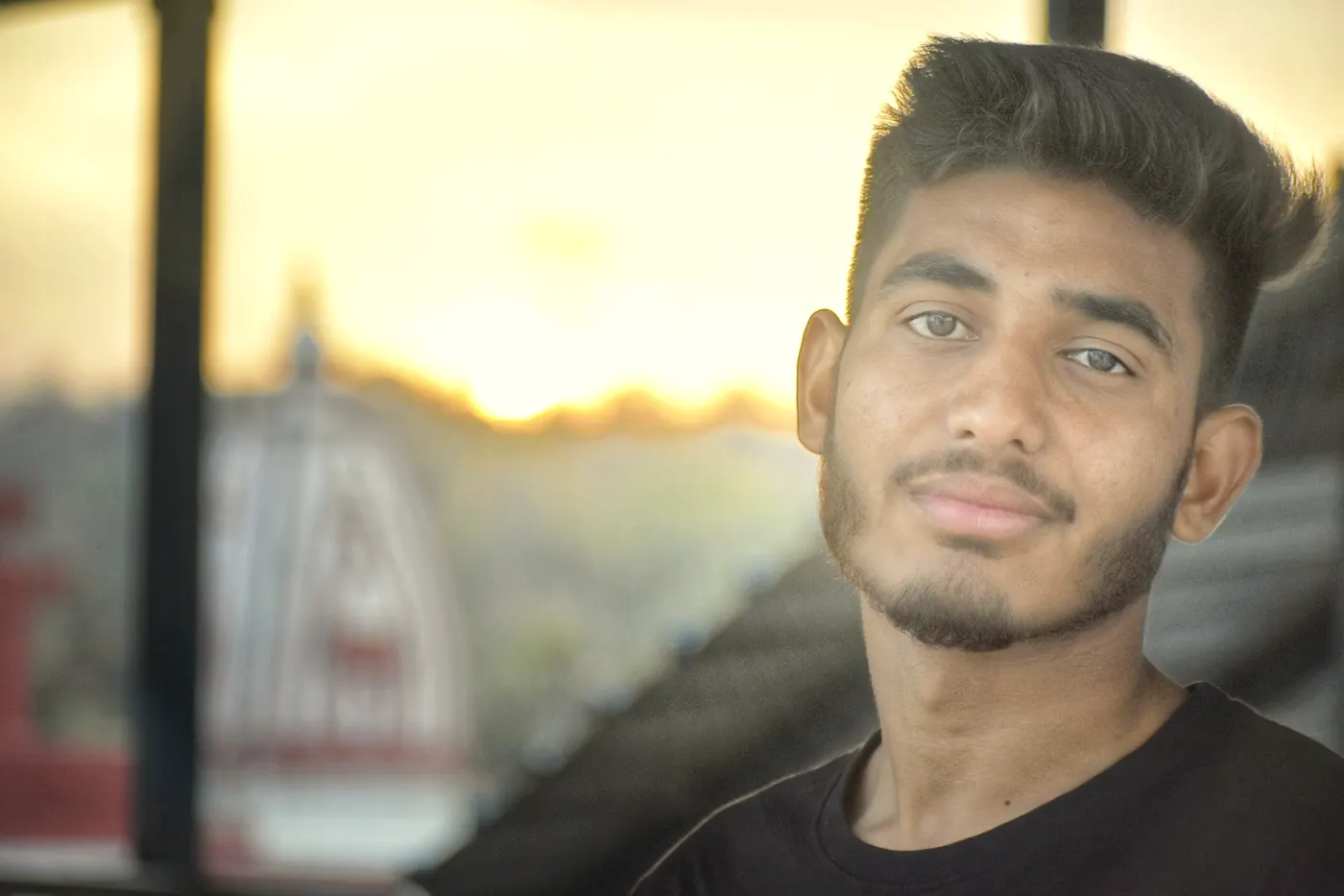 Portrait of a young man in warm evening light.